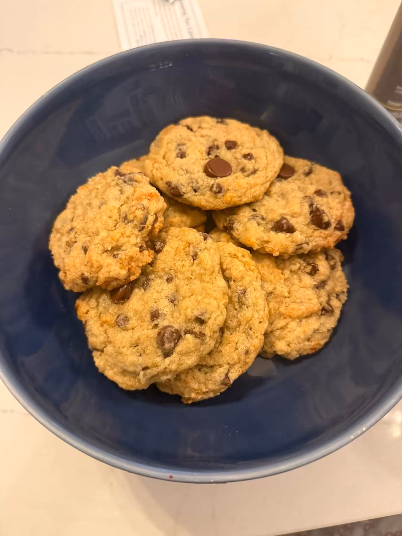 Banana bread chocolate chunk cookies in a blue bowl