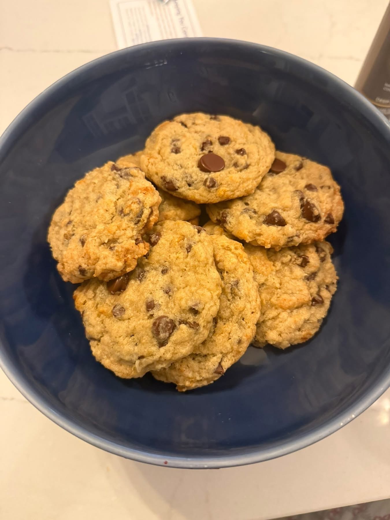 Banana bread chocolate chunk cookies in a blue bowl